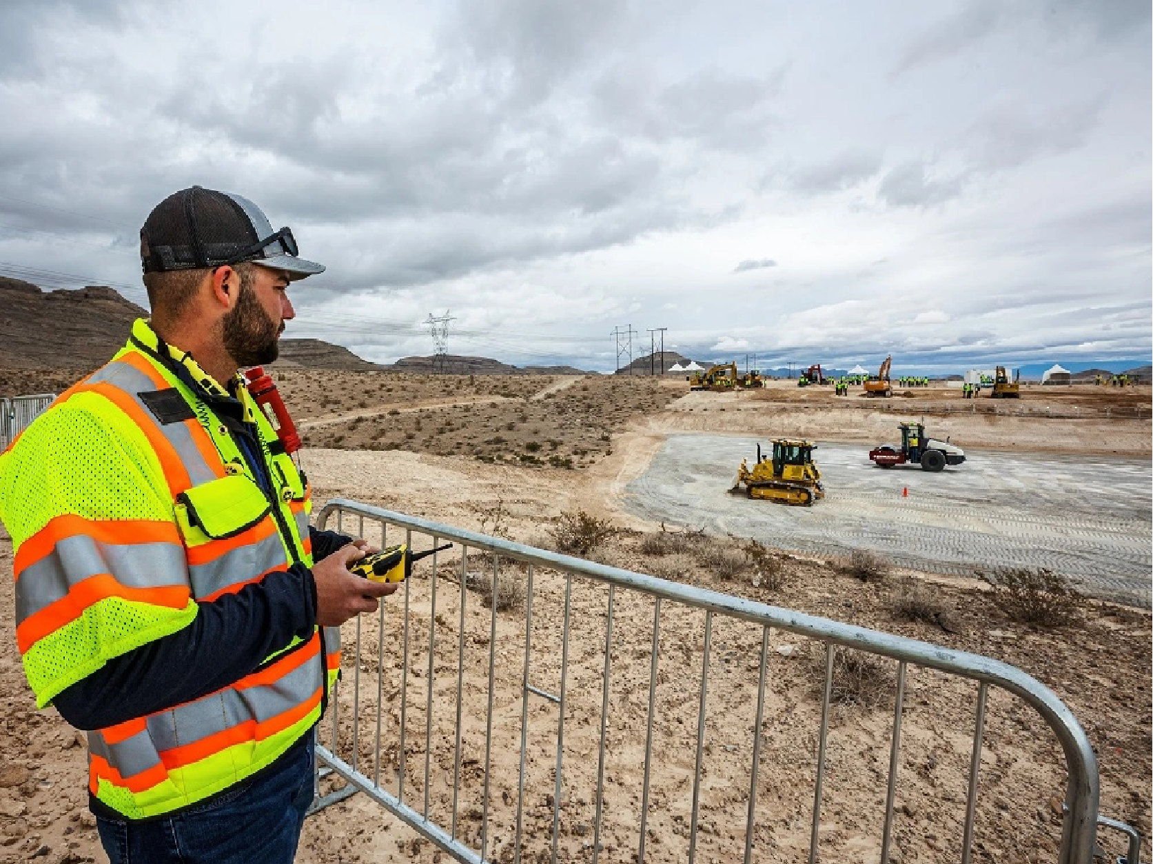 Trimble employee remotely controls a dozer at Dimensions 2022+ -- reflecting the industry's increased investment in autonmous technology solutions.